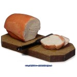 Loaf of Bread on Cutting Board