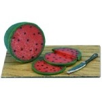 Dollhouse Sliced Watermelon is on a Cutting Board