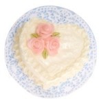 White Heart Cake With Pink Roses