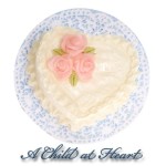 White Heart Cake With Pink Roses