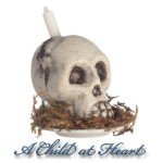 (*) Dollhouse Skull Candle