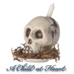 (*) Dollhouse Skull Candle