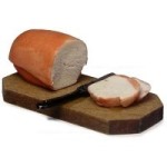 Loaf of Bread on Cutting Board